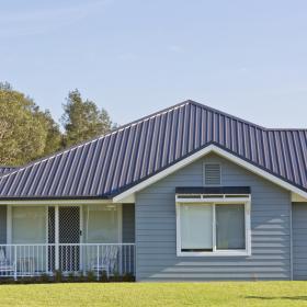 House with TRIMDEK steel roofing manufactured from COLORBOND steel in colour Woodland Grey