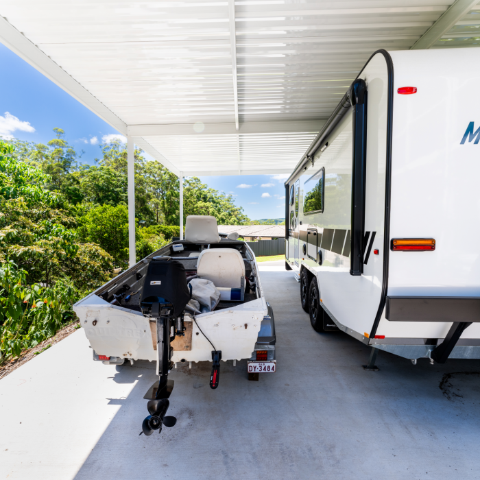 Lysaght Carport in Trimdek, which provides as a shelter for the boat and caravan.